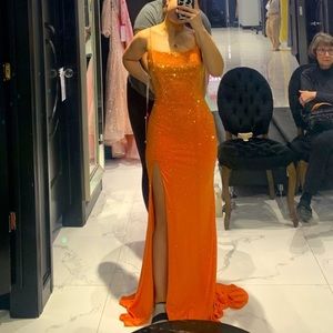 Orange Ellie Wilde prom dress. Worn once and in great condition.